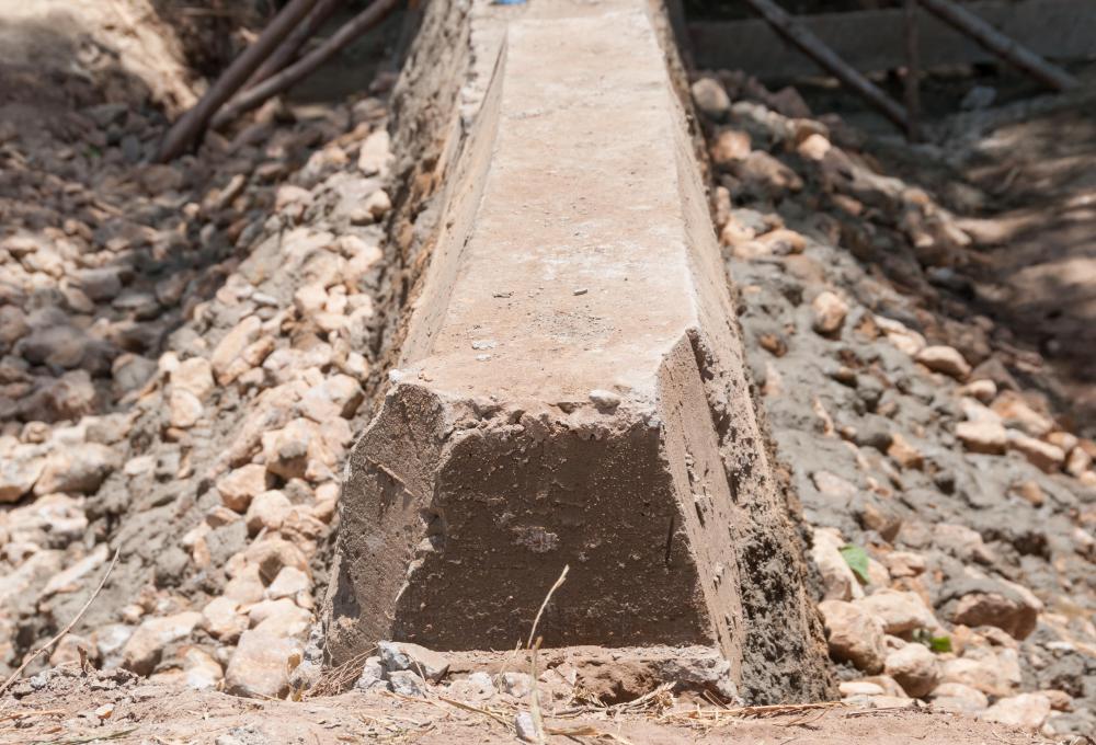 Levees may be reinforced by rocks or concrete to prevent flooding.