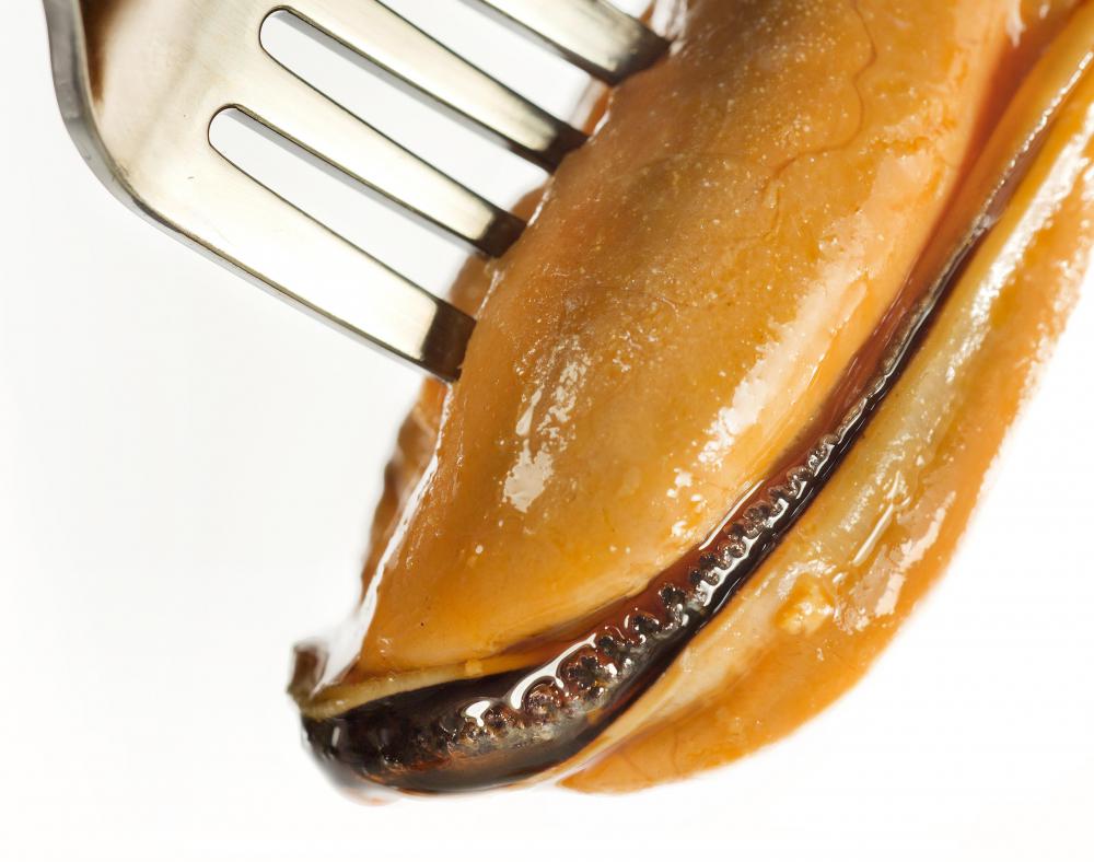 A mussel cooked and out of its shell.