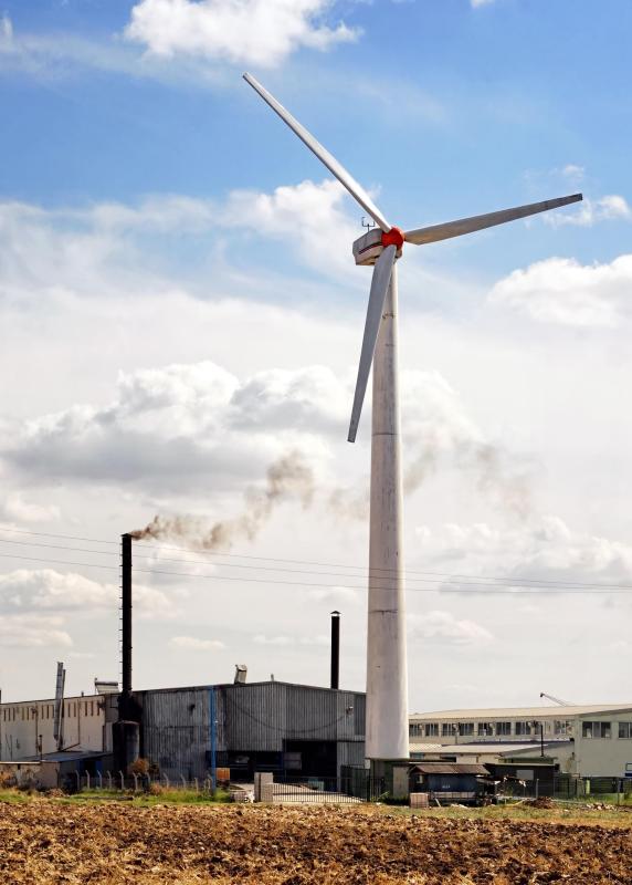 Cap and trade programs encourage investment in green energy sources to reduce pollution because factories can then sell excess credits.