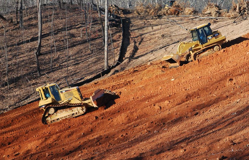 Fire lines are often made by churning up the earth with bulldozers.