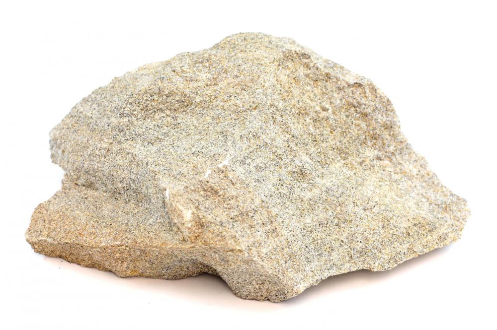 A piece of sandstone, a sedimentary rock.