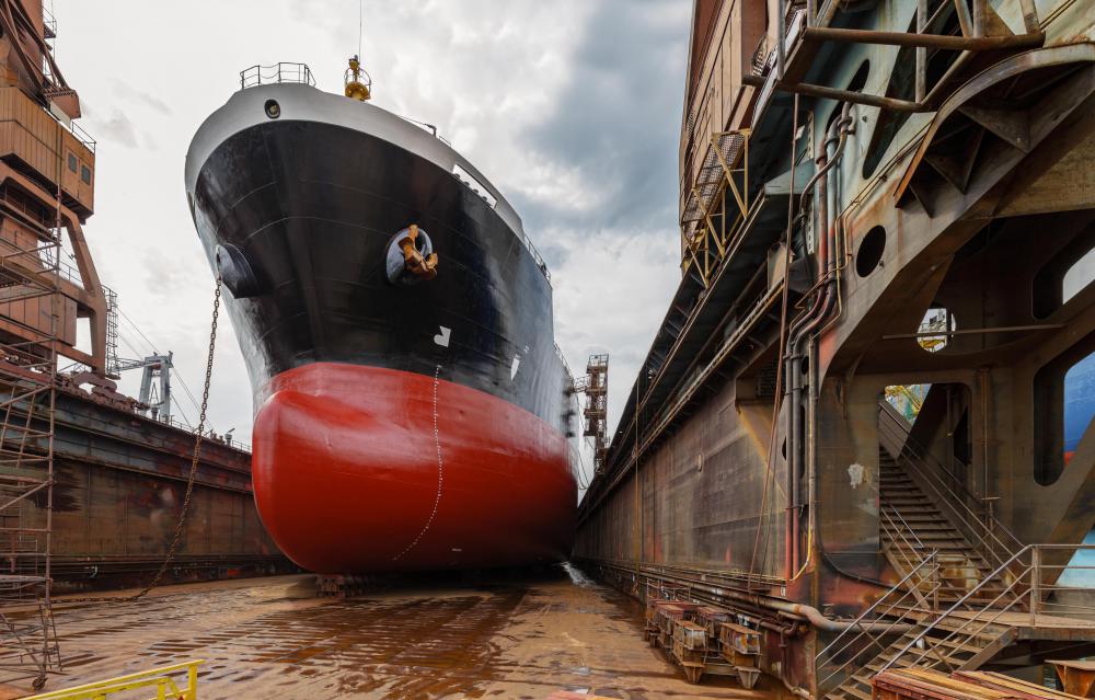 A ship with a hull that has been damaged by an iceberg may have to be repaired in dry-dock.