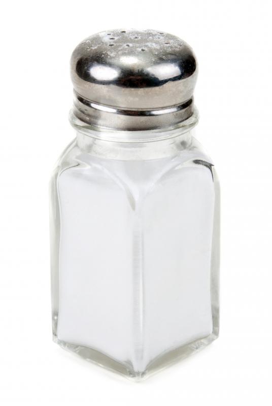 Table salt can be dissolved in distilled water to make a saline solution that can be used to clean a dog's eyes.