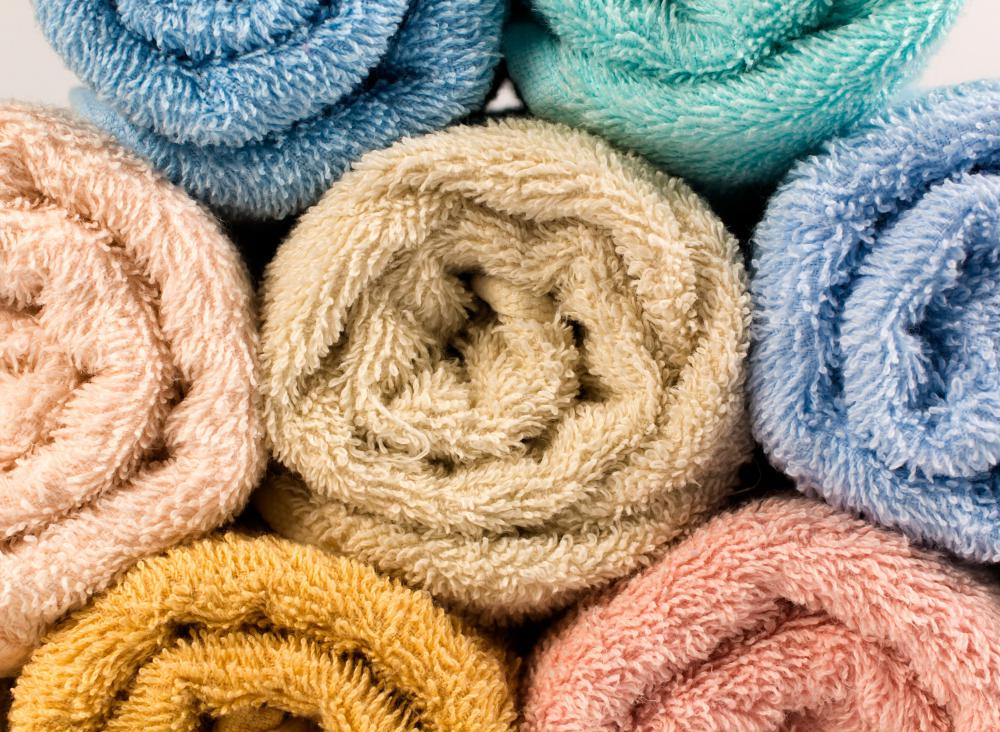 A dog should be dried with absorbent towels before using a hair dryer.