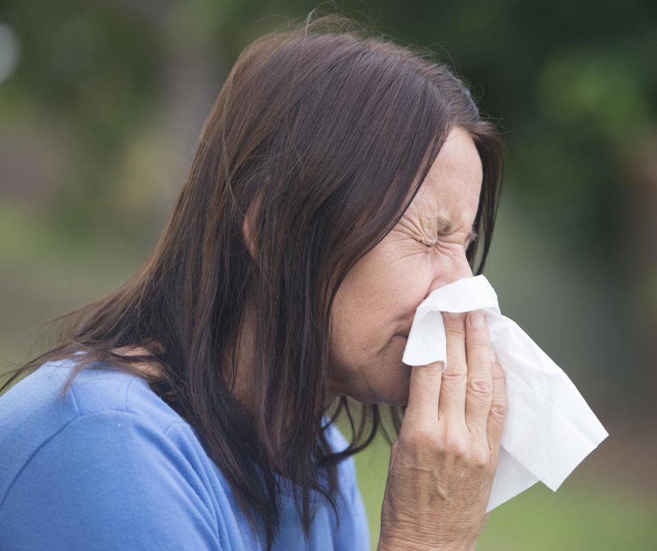 Individuals who have allergies to pets may experience a runny nose and sneezing.