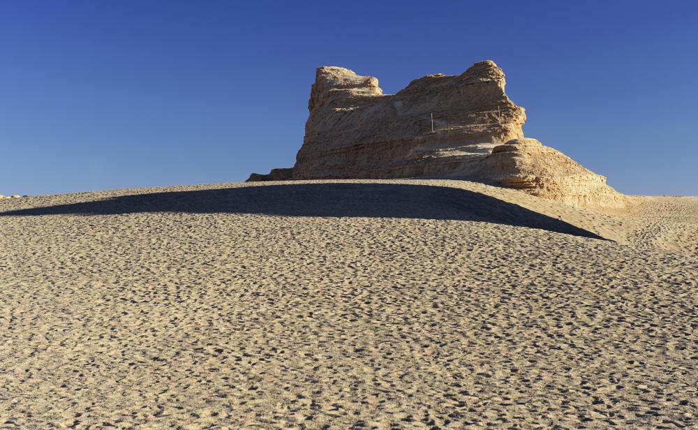 Many yardangs, rock formations shaped by the wind, are made of sandstone.