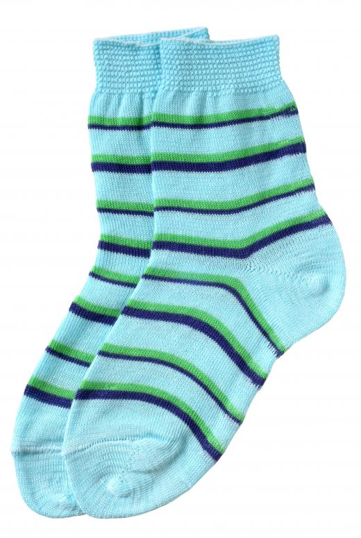 Wearing warm clothing and socks can help reduce the energy needed to heat a home.