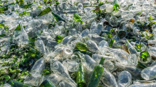 Many bottles end up in landfills.