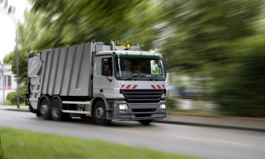 Trash is collected and transported to landfills.