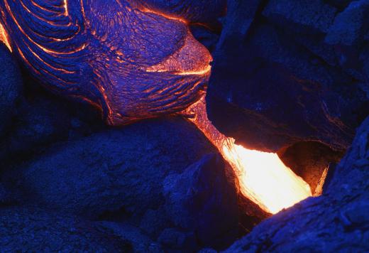 Rift zones are fractures in the Earth where magma rises to the surface as lava.