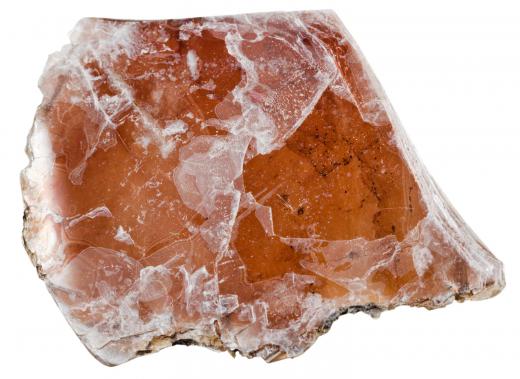 Mica, or isinglass, forms in thin transparent layers.