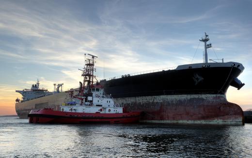 The captains of tugboats that assist larger ships in harbors must be aware of how the tide affects water depth changes.